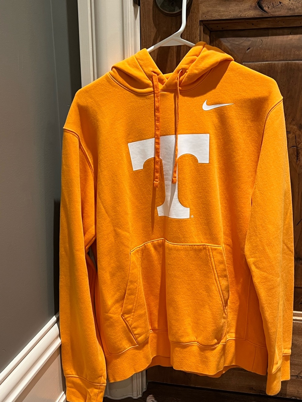 Nike Orange Pullover Hoodie with White 'T' and Swoosh